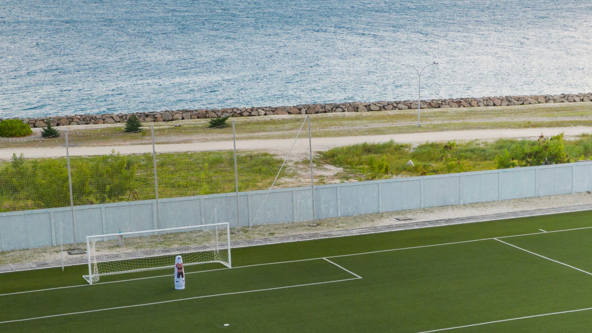 Seaside training pitch at sunrise